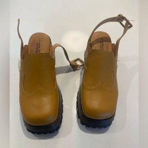 Brand-new Charlotte Stone clogs!